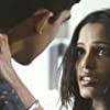 Dev Patel and Freida Pinto in i i