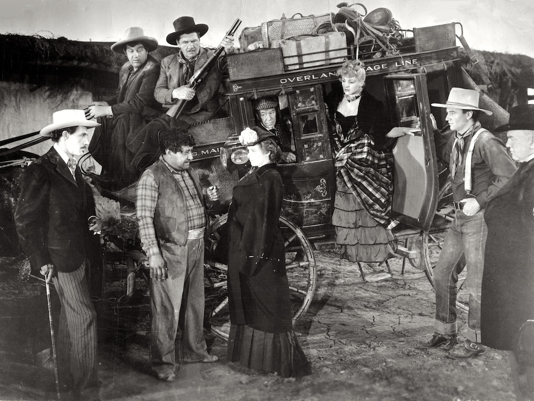 John Wayne John Carradine George Bancroft Berton Churchill Andy Devine Donald Meek Thomas Mitchell Louise Platt and Claire Trevor in Stagecoach 1939