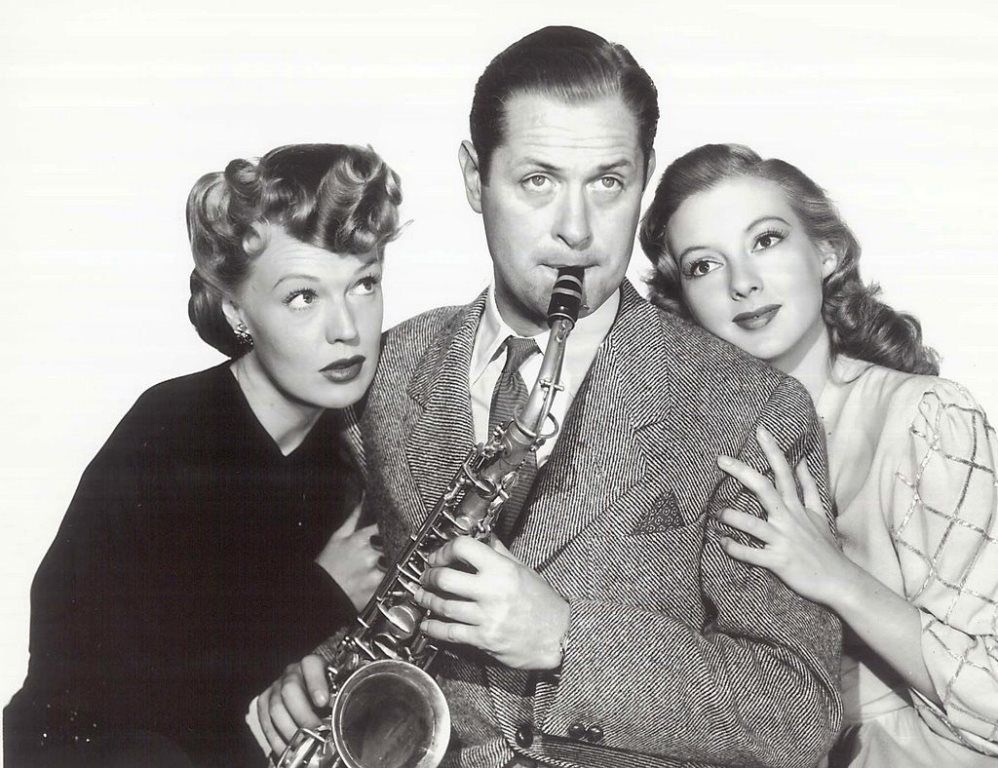 Rita Johnson Evelyn Keyes and Robert Montgomery in Here Comes Mr Jordan 1941